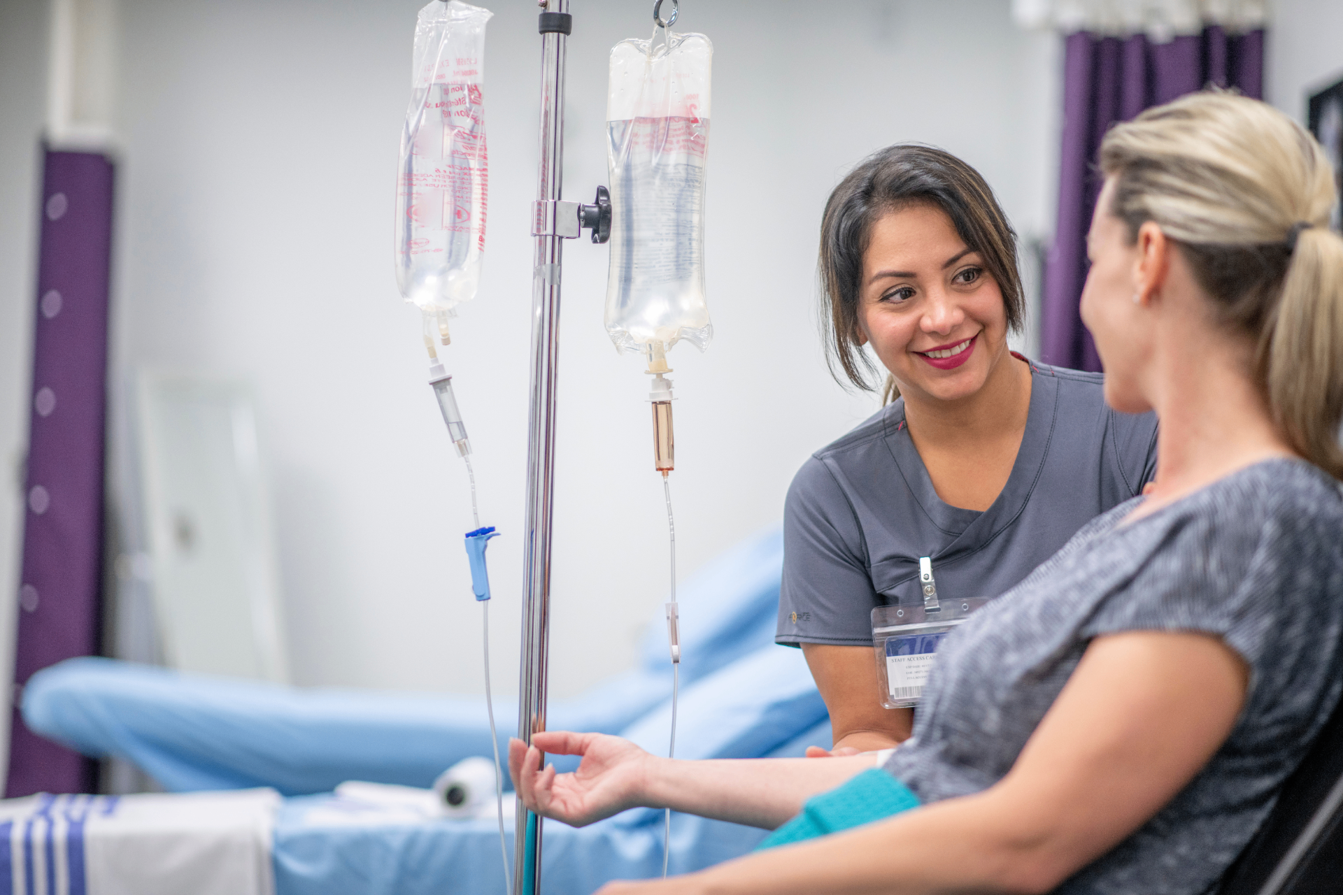 Registered Nurse with a guest during a stem cell IV infusion at iCRYO Avon